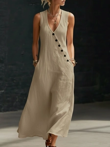 Detail of khaki cotton linen maxi dress with V-neck, buttons, and side pockets