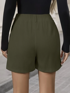 Detail of olive green ribbed knit shorts for women with elastic waistband and wide leg cut