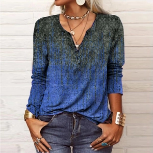 Detail of V-neckline with buttons on long-sleeve tee featuring vintage baroque print