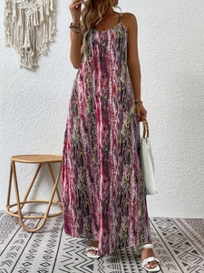 Detail of bohemian spaghetti strap maxi dress with pink and purple marble print