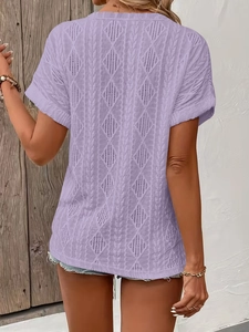 Detailed back view of a lavender crochet short sleeve top with openwork diamond patterns