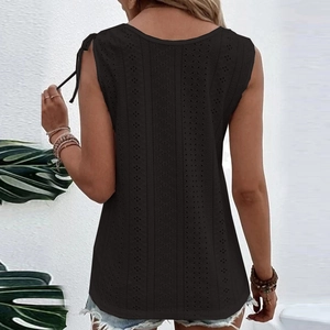 Detailed back view of black hollow out sleeveless top with shoulder bow tie detail