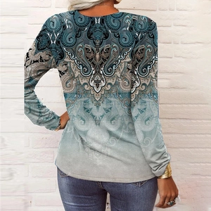 Back view of women's long sleeve T-shirt with teal paisley and ethnic print patterns