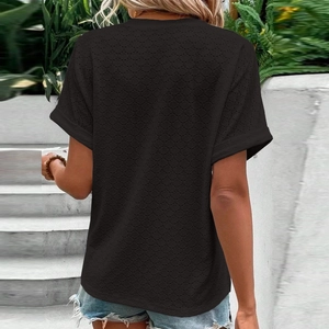 Detail of black V-neck t-shirt with hollow eyelet fabric and relaxed fit style