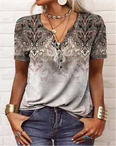 Detailed view of paisley print pattern on short sleeve Henley neck t-shirt for women