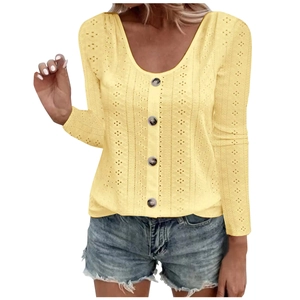 Women's light yellow long sleeve pointelle knit top with round neck and button detail