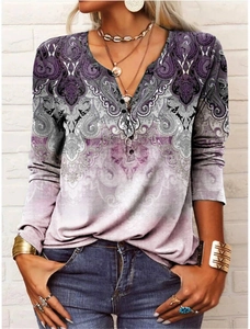 Women's long sleeve V-neck top featuring purple paisley print and button closure