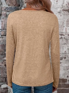Rear view of a casual long-sleeved camel V-neck top showing a textured knit fabric on a model