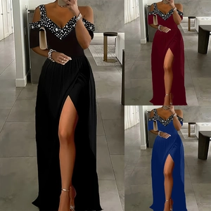 Off-shoulder maxi dress with high slit and polka dot V-neck in black, red and blue