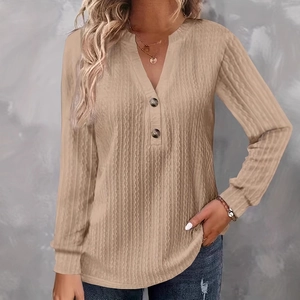 Damesshirt met lange mouwen, V-hals en decoratieve knopen in wafelgebreide stof