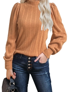 Detail of ginger long sleeve knit sweater featuring vertical ribbed texture and high collar