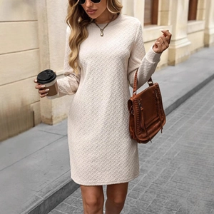 Chic beige long sleeve knit dress with herringbone texture and round neck in loose fit