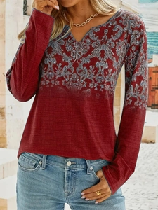 Chic burgundy V-neck long sleeve top with grey baroque patterns and textured fabric