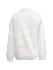 Detail showing the white long sleeve sweatshirt with textured 3D square embossed fabric