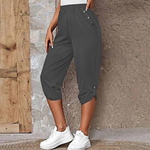Women's dark grey cropped casual pants with elastic waist and decorative silver buttons