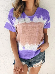 Detail shot of women's round neck T-shirt featuring purple and white tie-dye print pattern