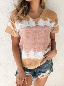 Detail of loose fit tie-dye t-shirt with earth tone stripes and casual crew neck