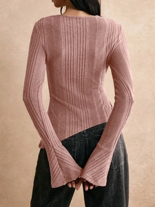 Detailed back view of ribbed knit long sleeve top with stylish flared cuffs in rose pink
