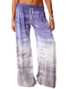 Detail of wide-leg yoga pants with purple gradient, elastic waist and white drawstring