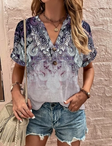 Detail view of V-neck top with paisley print and wooden buttons for women