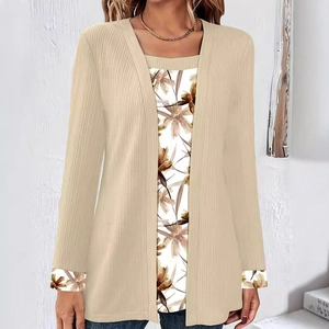 Women's faux two-piece long sleeve top featuring beige cardigan and floral print insert