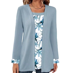 Women's two-piece set featuring light blue ribbed cardigan and blue floral print inner top