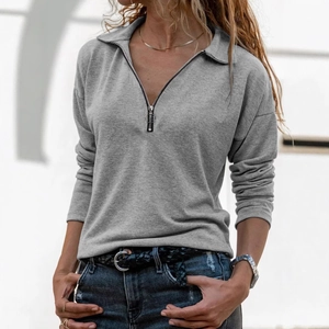 Women's gray knit polo sweater with quarter-zip ring collar and relaxed drop shoulder design