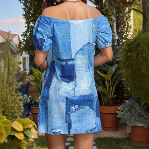 Back view of off-shoulder lantern sleeve dress featuring vintage denim patchwork print