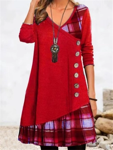 Detail of V-neck casual dress with plaid patchwork, decorative buttons and tassel necklace