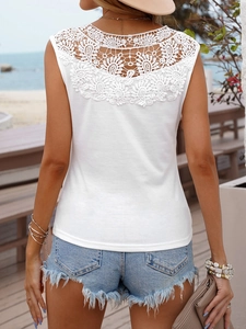 Women's white sleeveless V-neck top with intricate lace back panel and casual fit