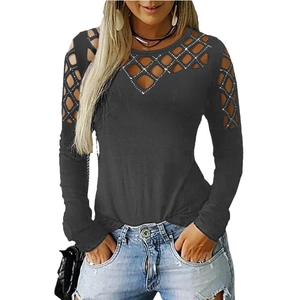 Women's black long sleeve top with rhinestone hollow out diamond cutouts and slim fit design