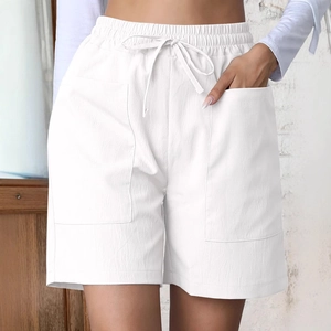 Women's white high-waisted linen shorts with elastic drawstring waist and large front pockets