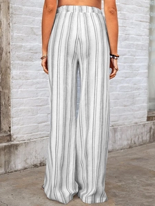 Rear view of high-waisted wide-leg trousers with vertical grey stripes and elastic waistband