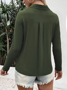 Rear view of olive green long sleeve shirt showing classic back pleat detail and collar