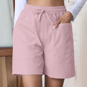 Women's high waist loose linen shorts in dusty pink with drawstring and pockets