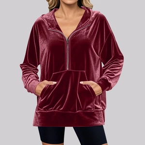 Detailed view of the velvet fabric texture on this burgundy half-zip hoodie