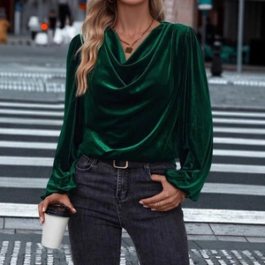 Elegant forest green velvet long sleeve top featuring a chic turtleneck and soft texture