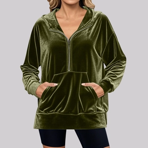 Detail of olive green velvet hoodie showing kangaroo pocket and smooth half-zip V-neckline