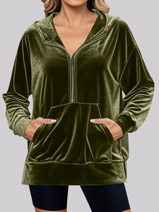 Deep green oversized velvet hoodie for women with half-zipper design and kangaroo pocket