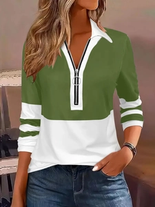Close-up of color-block long sleeve polo shirt featuring white collar and metal ring zipper