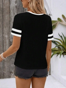 Back view of black short-sleeve T-shirt with white striped cuffs and minimalist fit