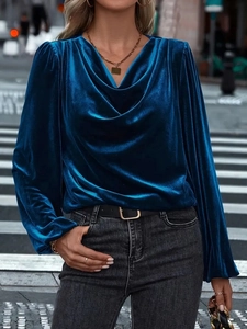 Royal blue velvet long sleeve top with draped cowl neck and elegant puffed cuffs