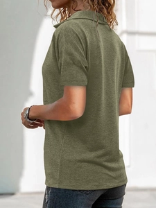Detail showing knit texture and polo collar with zipper of the army green casual T-shirt