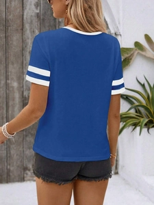 Detail of blue t-shirt sleeve with white stripes and contrast trim on the collar