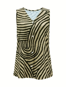 Macro detail of V-neck sleeveless top with brown zebra print and white buttons