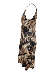 Detail view of backless tropical leaf print dress with adjustable straps and slim silhouette