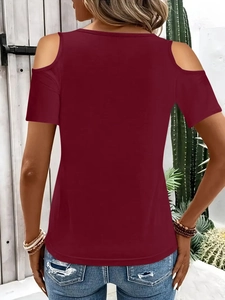 Back view of a burgundy cold shoulder T-shirt featuring knit fabric and a relaxed fit