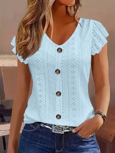 Close-up of sky blue V-neck top featuring eyelet embroidery and ruffle sleeves details