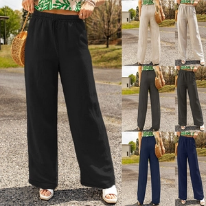 Detail view of high waist wide leg cotton linen trousers with drawstring waist and pockets