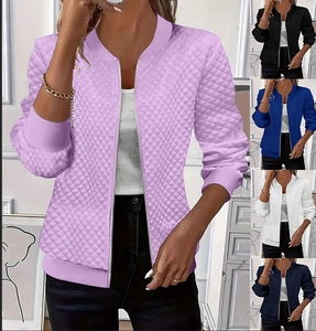 Detail of quilted texture and elastic ribbed cuffs on a slim fit zip-up bomber jacket